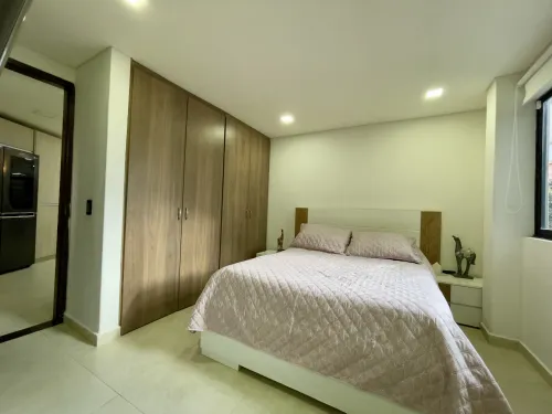 Habitaci&oacute;n con cama